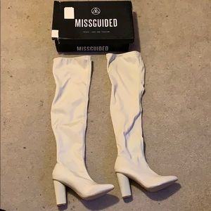 Thigh high boots, never worn.